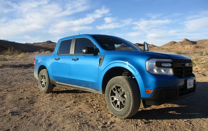 Real World Fuel Economy:  25 MPG after 2" Level Lift & 245/65R17 Wildpeak Tire Install on 2.0 Maverick