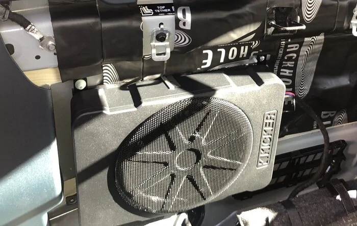 Kicker Hideaway HS10 installed behind rear seats