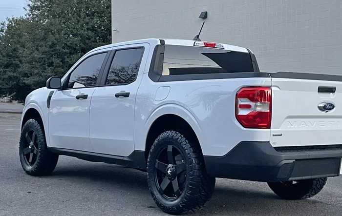 Hybrid XL FWD build w/ Rough Country Leveling Kit, 265/60/18 Nitto Ridge Grapplers, 18" KMC wheels