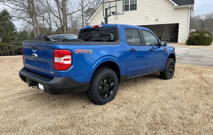 Velocity Blue Maverick with 2" Rough Country Lift and KO2s