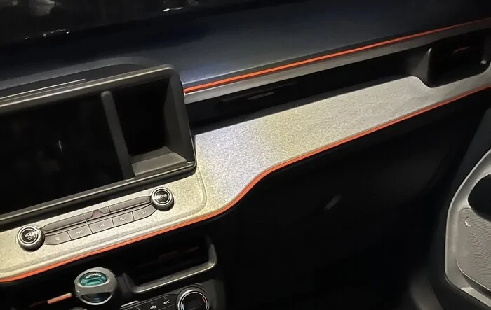 Modified dash with orange trim strip -- before & after. Feedback for 1st timer?
