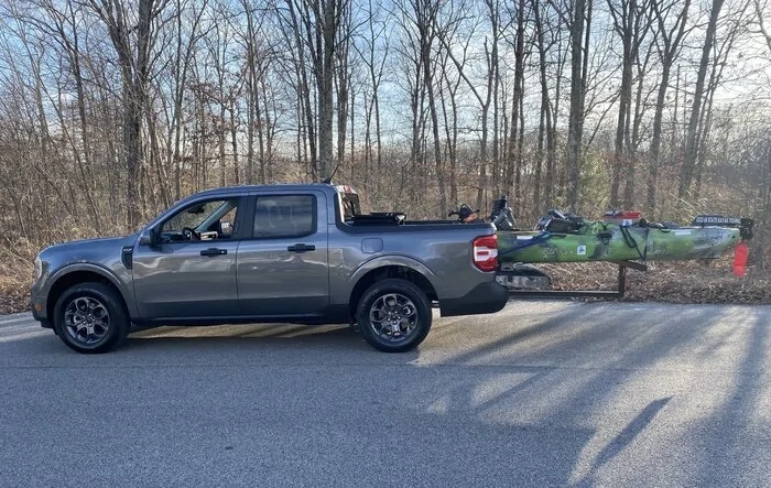 My Maverick hauling a 13 foot kayak!