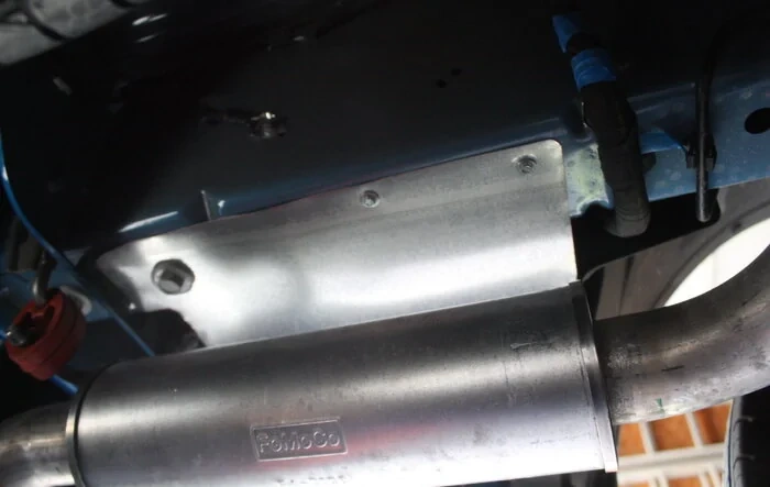 Custom fabricated cover / filler panel for left rear underbody opening