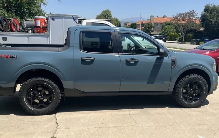Busy two weeks: 2” lift, BFG KO2’s 245/65, bed lighting, switch cup coasters, red Maverick letters, shackle hitch receiver, bed rack system