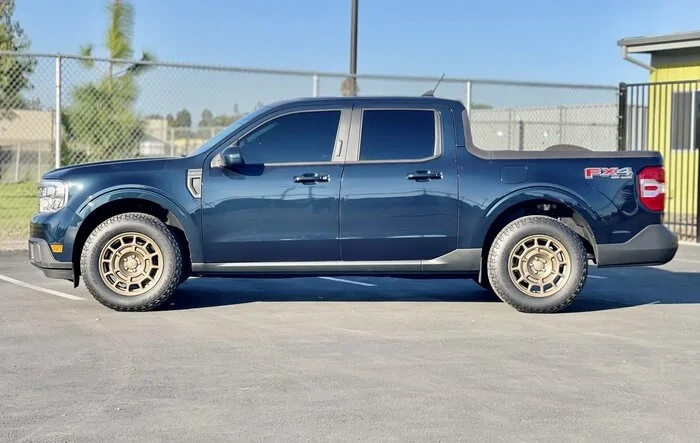 Maverick on Aftermarket 17x8" Fifteen52 Metrix MX Bronze Wheels and 245/65/17 BFG Trail Terrain Tires