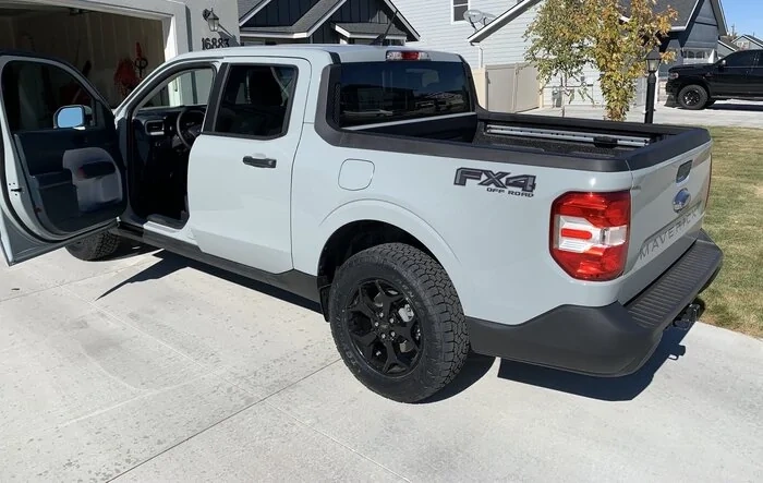 235/65 Toyo Open Country AT3 tires installed on XLT FX4 Maverick + new non-red FX4 decal