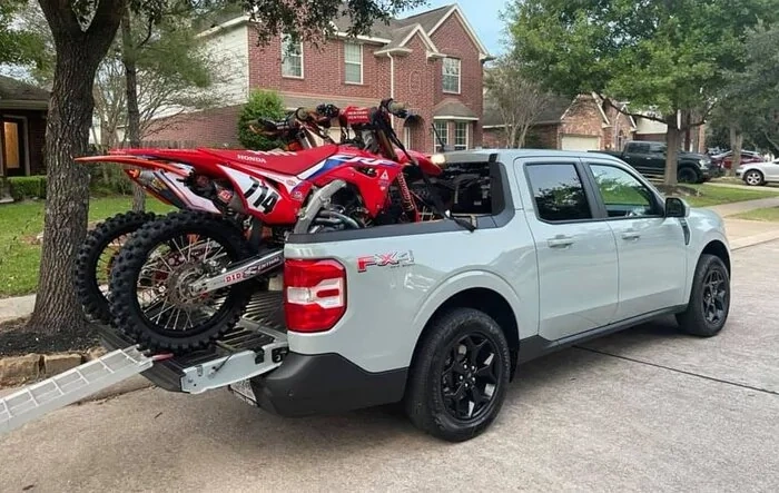 Maverick bed fits two dirtbike motorcycles (Honda 450 and a KTM 300)