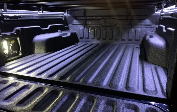 Ambient lighting installed on XLT: rear console vault, bed power ports, bed lighting