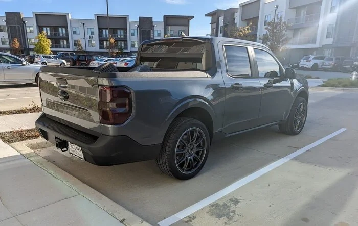 Tinted tail lights, sides, windshield + OZ Racing aftermarket wheels