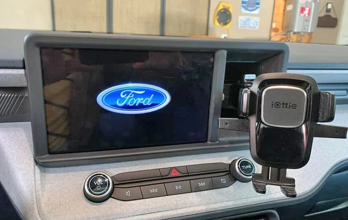 Smartphone holder suction mount transforms Maverick dash cubby into functional space