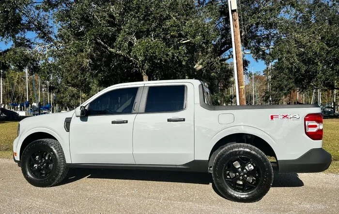 Installed: 4WP lift kit (1" front / .75" rear) and Toyo Open Country AT tires (245/70r17)