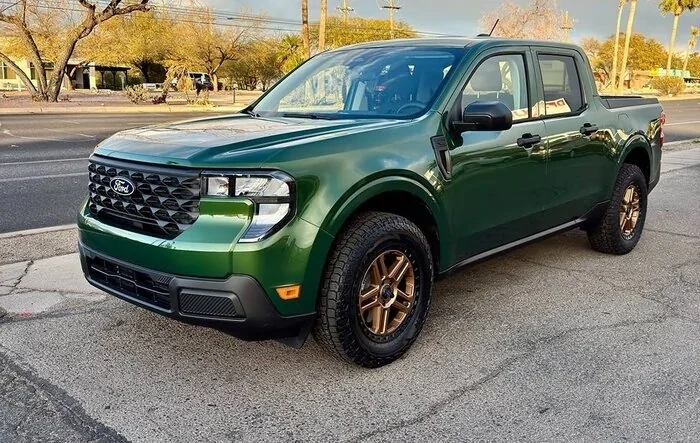 All-Terrain AT Tires & Aftermarket Wheels transformed my 2025 Maverick Eruption Green XL Hybrid AWD with 4k towing