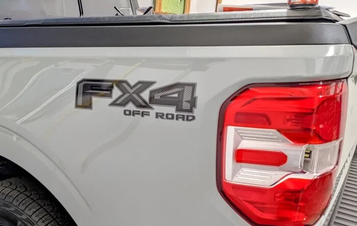 Changed FX4 decals to black and gray.