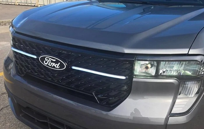 Installed DRL/Signal LED light bars on grille of 2025 Maverick