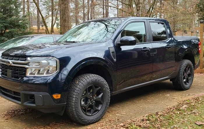 Lariat 2.0 AWD loaded with 2” FRL lift, Wildpeak AT3W, custom decals