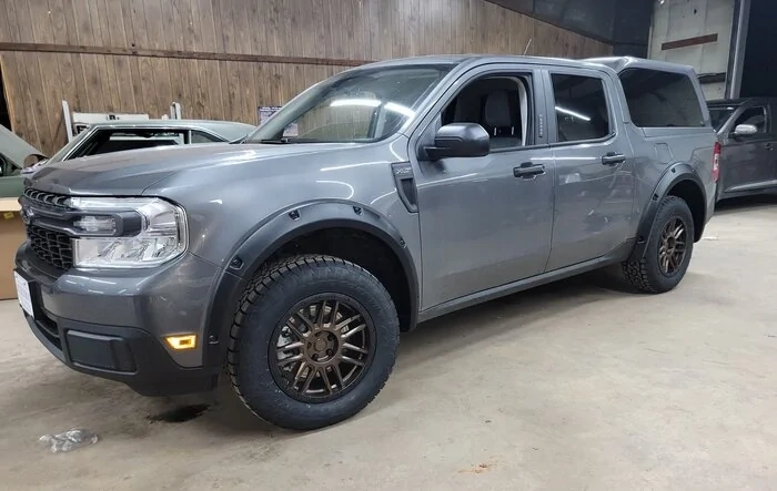 Maverick XLT with SnugTop bed cap, Bushwacker fender flares, Black Rhino wheels, 245/65/17 Toyo AT