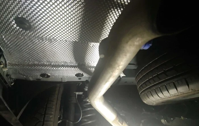Added Embossed Aluminum Heat Shield to Underbody Cavity Shield
