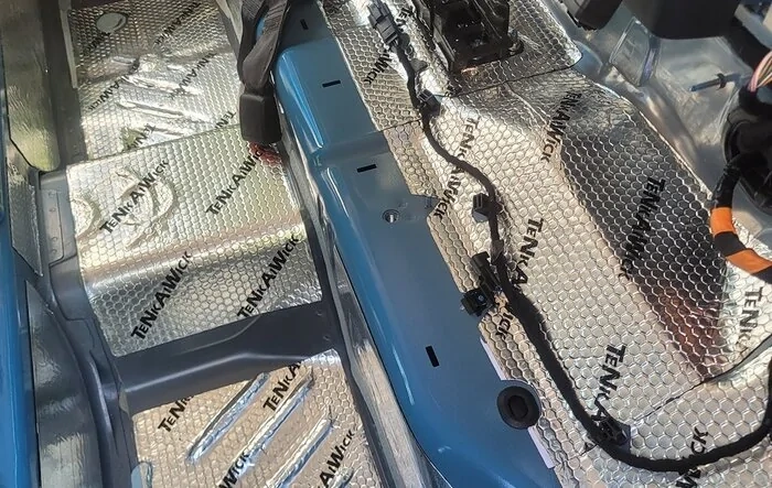 Installed sound deadening material to fenders, under back seat and inside back doors