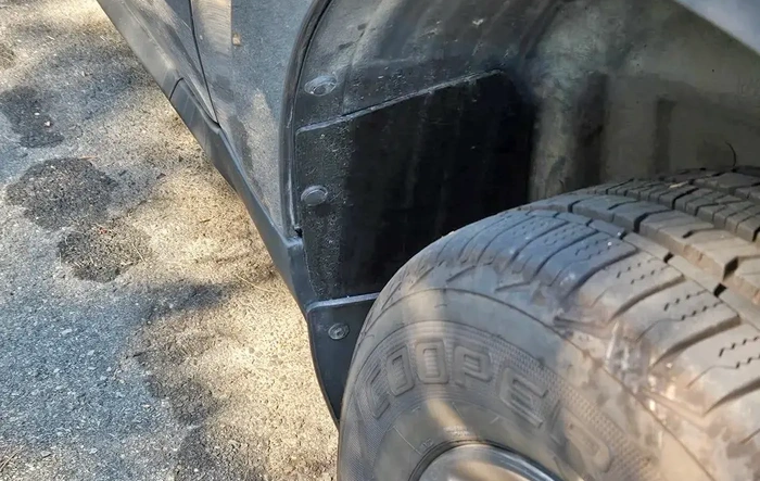 Homemade rear wheel well hole covers