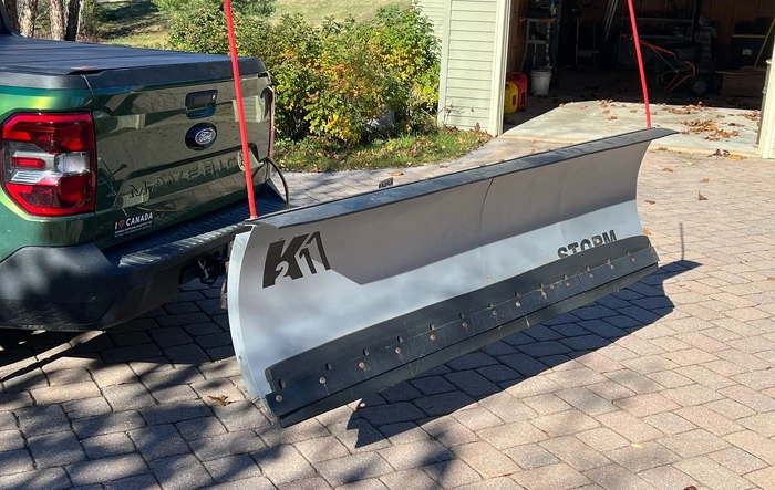 Rear mounted snow plow installed