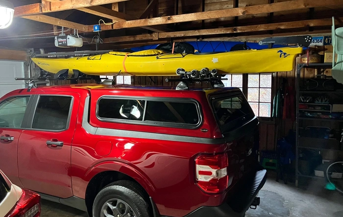 Sierra Xtra Topper + Yakima installed for carrying kayaks