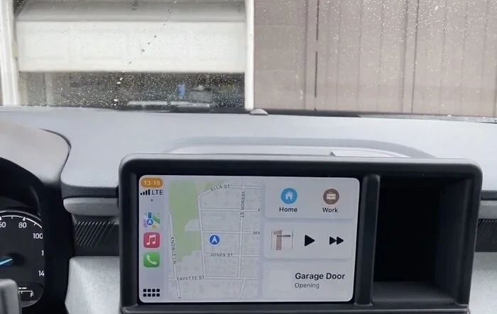 I have a CarPlay garage door opener working on my Maverick using MyQ App + iPhone.