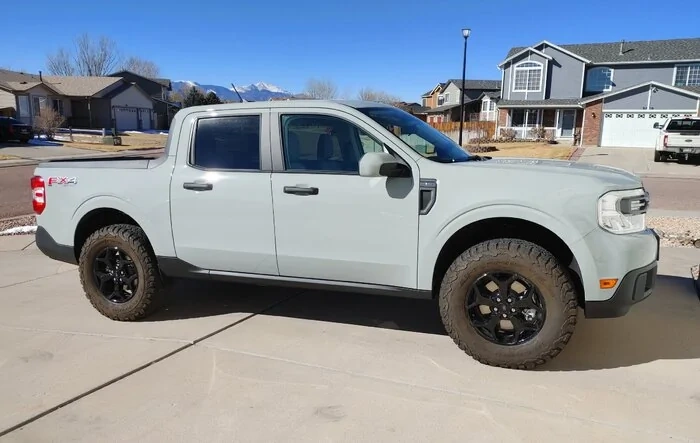 Installed 2" lift kit and 32" BFG KO2 tires (no rub with some trimming)
